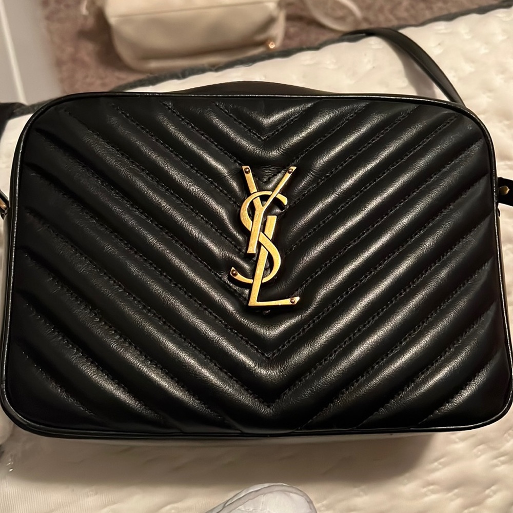Selling YSL crossbody camera bag. Used, good condition. Comes with box + receipt
